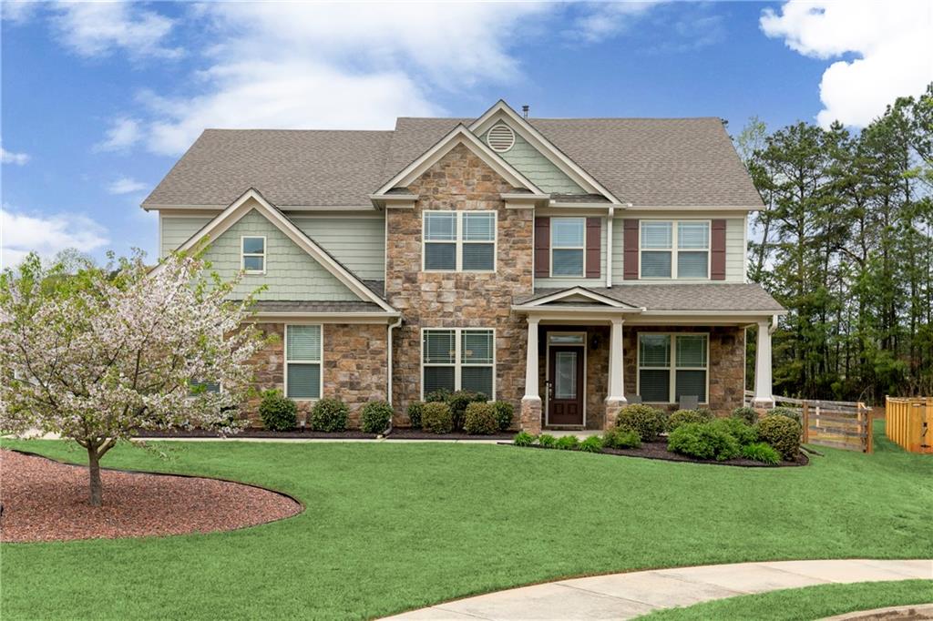 152 Greatwood Lane Villa Rica, GA 30180 - Photo 1 of 48 a front view of a house with a yard