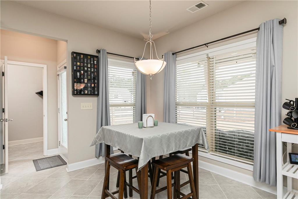 152 Greatwood Lane Villa Rica, GA 30180 - Photo 15 of 48 a dining room with furniture and window