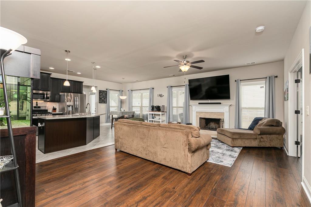 152 Greatwood Lane Villa Rica, GA 30180 - Photo 16 of 48 a living room with furniture and a fireplace