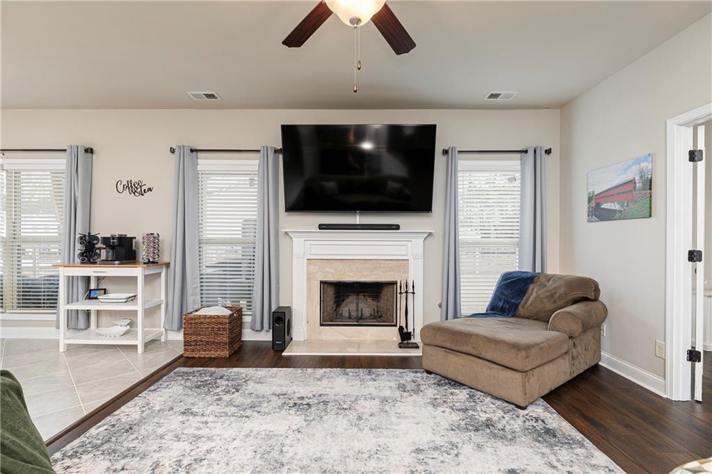 152 Greatwood Lane Villa Rica, GA 30180 - Photo 18 of 48 a living room with furniture and a fireplace