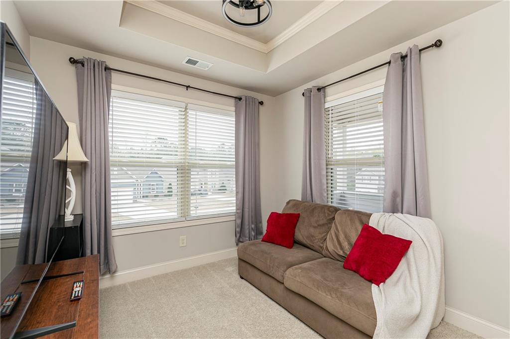 152 Greatwood Lane Villa Rica, GA 30180 - Photo 26 of 48 a living room with furniture and a window