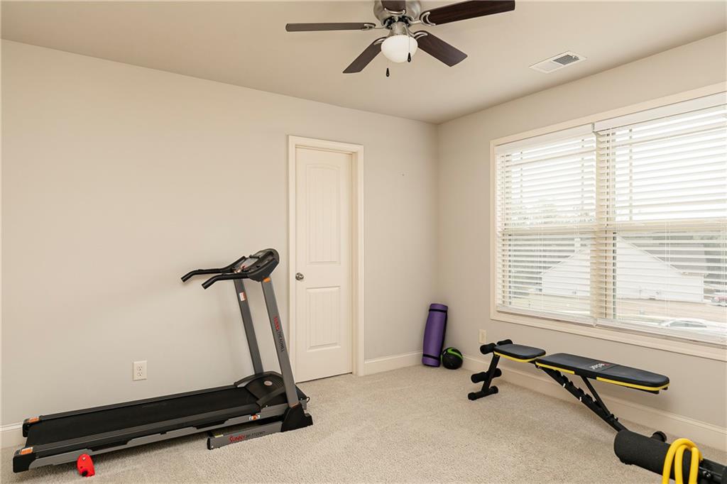 152 Greatwood Lane Villa Rica, GA 30180 - Photo 32 of 48 a view of a room with gym equipment