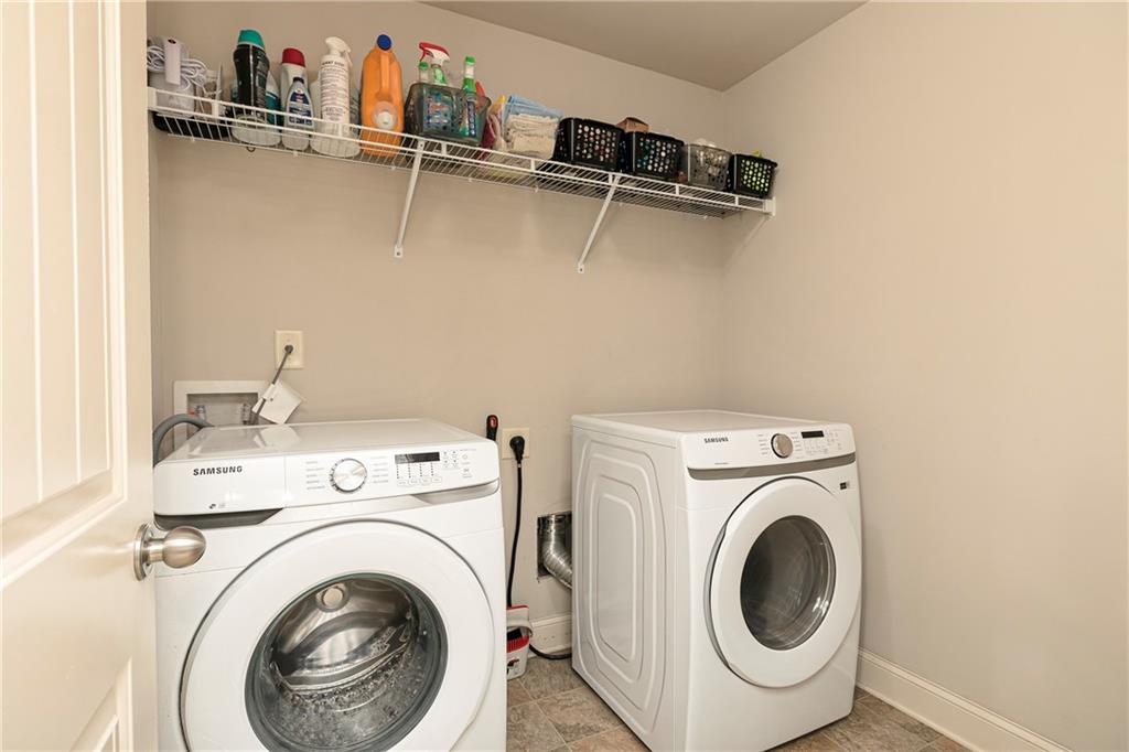 152 Greatwood Lane Villa Rica, GA 30180 - Photo 37 of 48 a utility room with dryer and washer