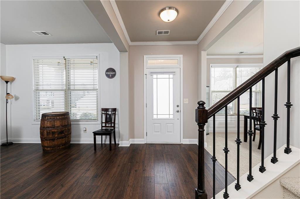 152 Greatwood Lane Villa Rica, GA 30180 - Photo 4 of 48 a view of main area with wooden floor and windows