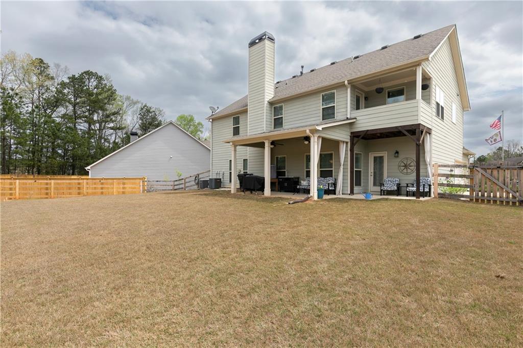 152 Greatwood Lane Villa Rica, GA 30180 - Photo 41 of 48 a front view of a house with a yard