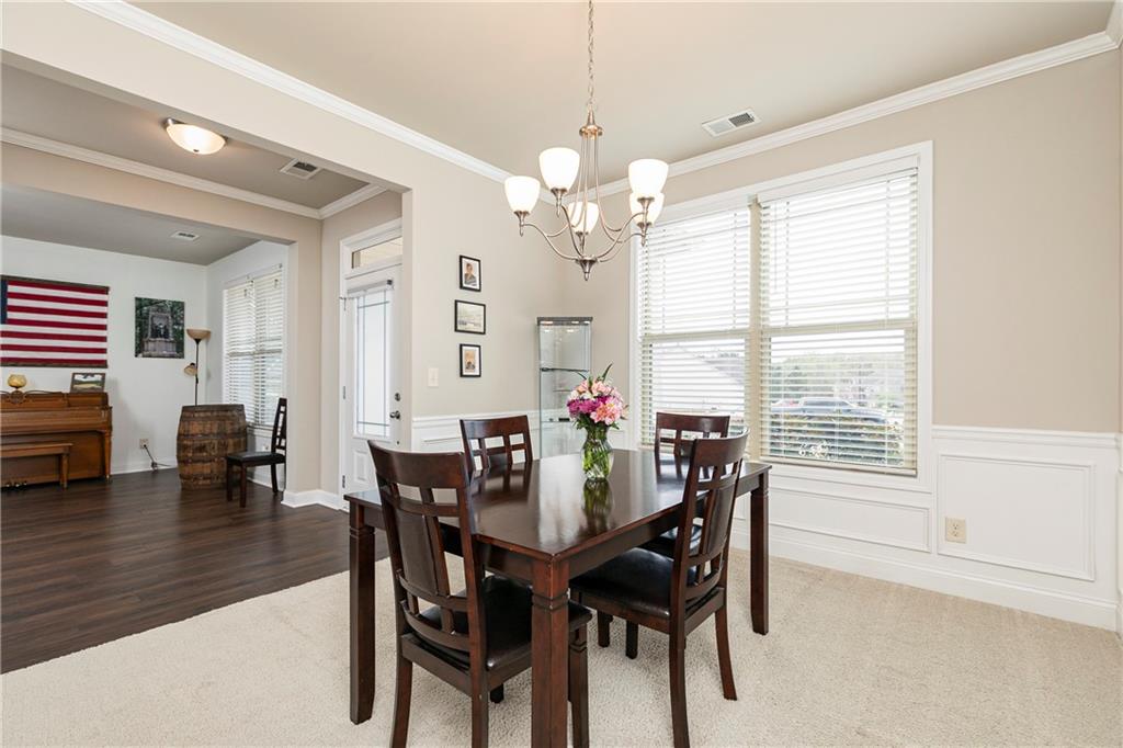 152 Greatwood Lane Villa Rica, GA 30180 - Photo 7 of 48 a view of a dining room with furniture and window