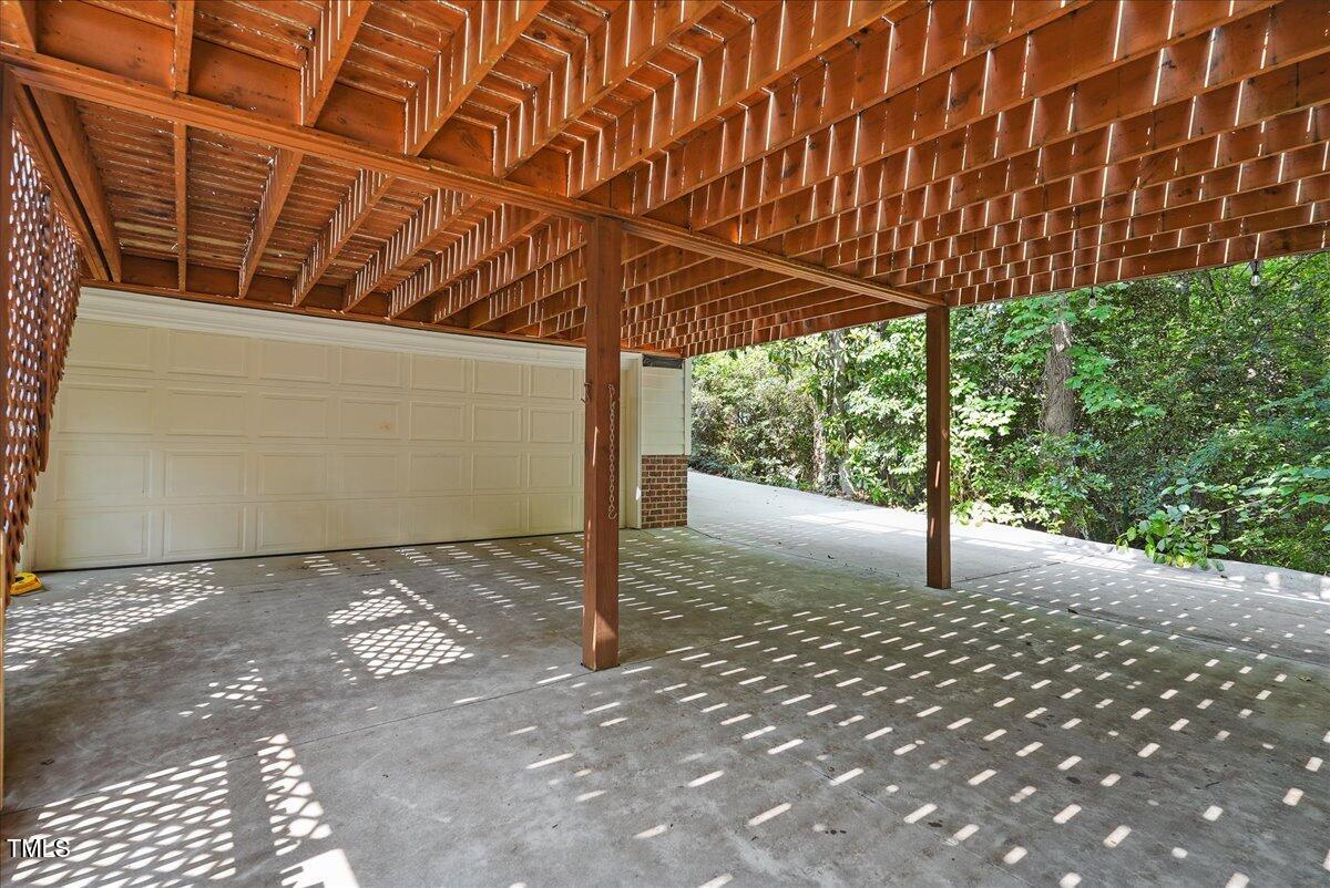 2725 Rosedale Avenue Raleigh, NC 27607 - Photo 52 of 66 Driveway space under the back deck