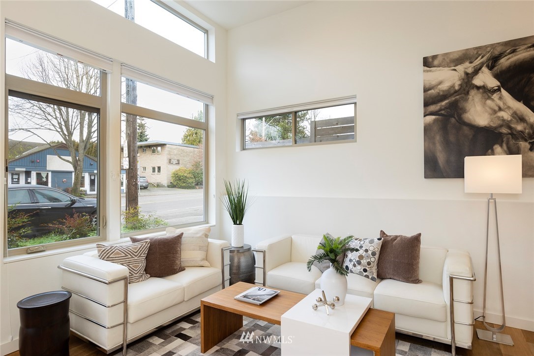 6012 A California Avenue Southwest Seattle, WA 98136 - Photo 2 of 30 a living room with furniture and a window