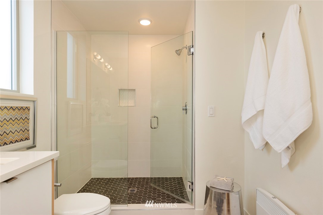 6012 A California Avenue Southwest Seattle, WA 98136 - Photo 18 of 30 a bathroom with a sink and toilet