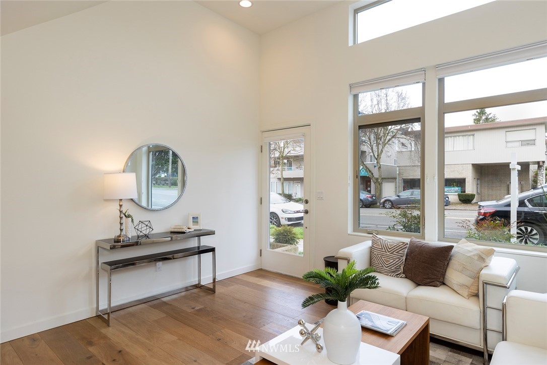 6012 A California Avenue Southwest Seattle, WA 98136 - Photo 4 of 30 a living room with furniture and a window