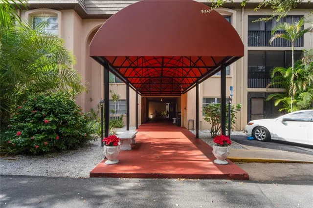 a view of a chairs and tables in the patio