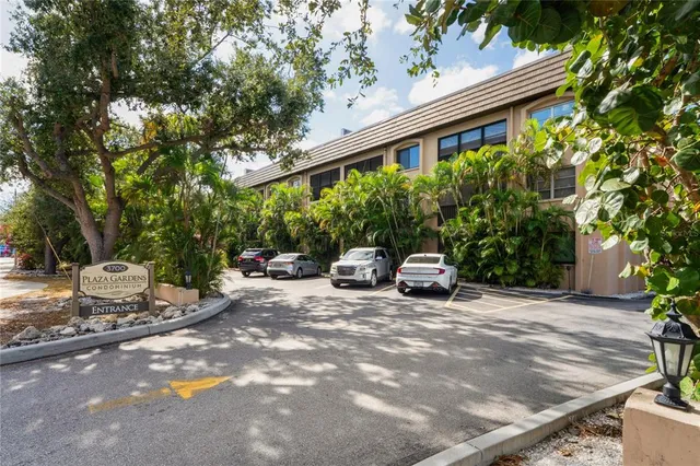 a view of a chair and table in the patio