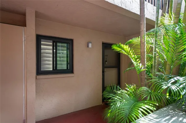 a plant that is in front of a house