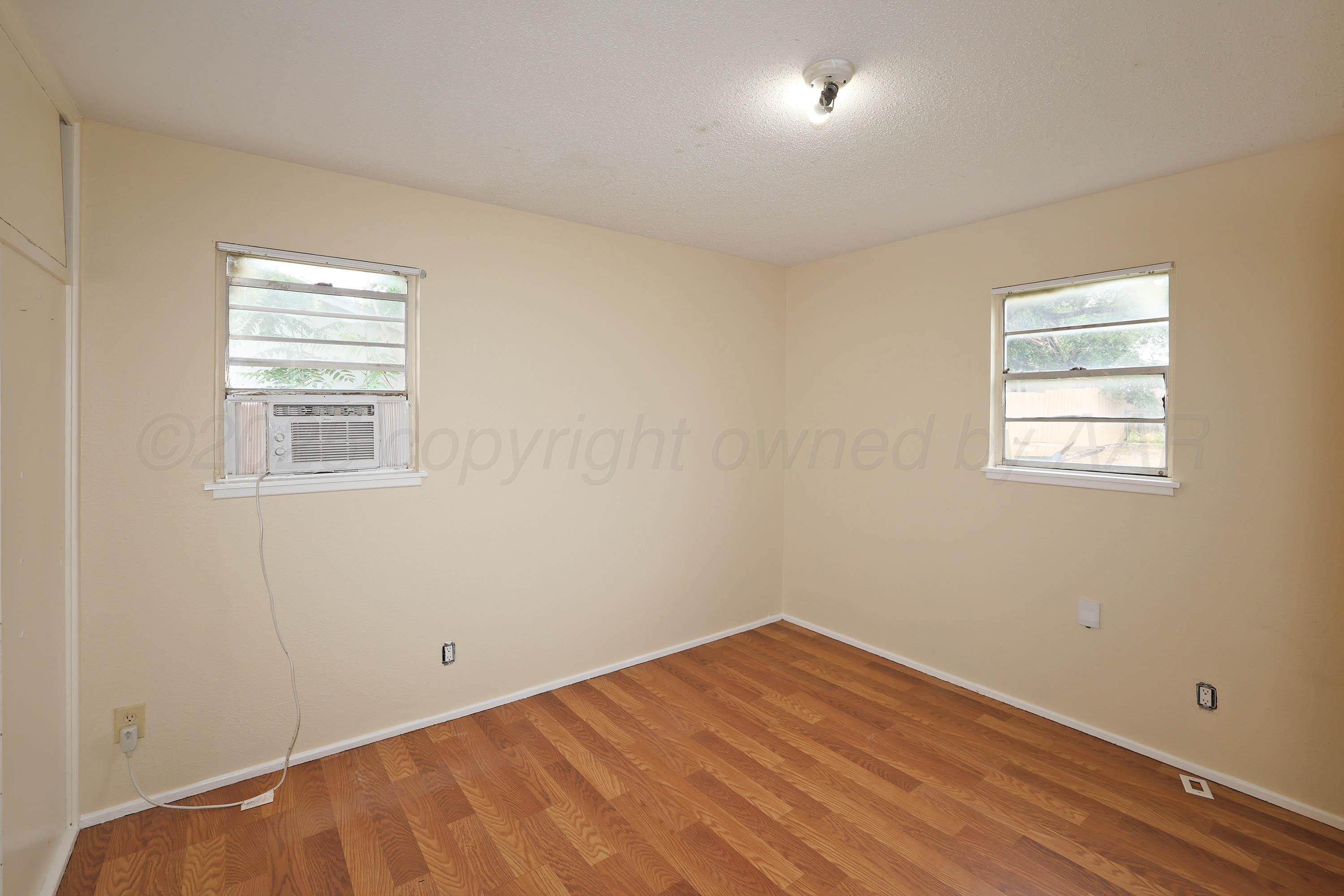 3810 Mesa Verde Drive Amarillo, TX 79107 - Photo 14 of 21 a view of empty room with wooden floor