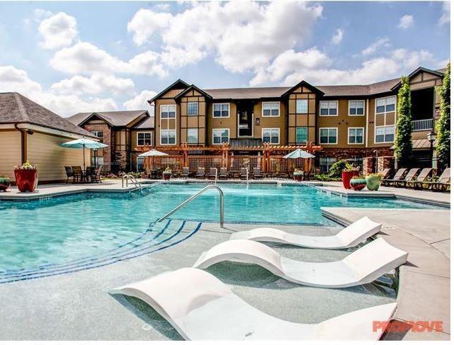 1836 Roswell Street, Unit 6304 Smyrna, GA 30080 - Photo 8 of 9 a view of a house with a yard porch and sitting area