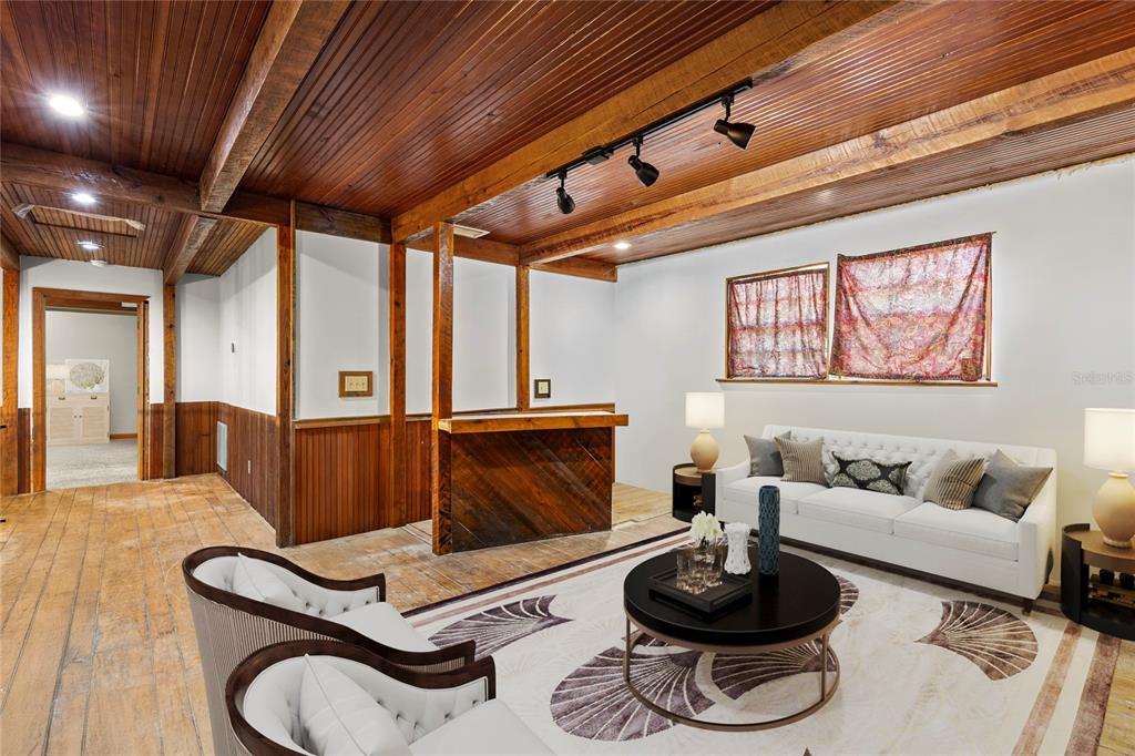 11419 Raschke Run Weeki Wachee, FL 34614 - Photo 9 of 19 a living room with furniture and a wooden floor