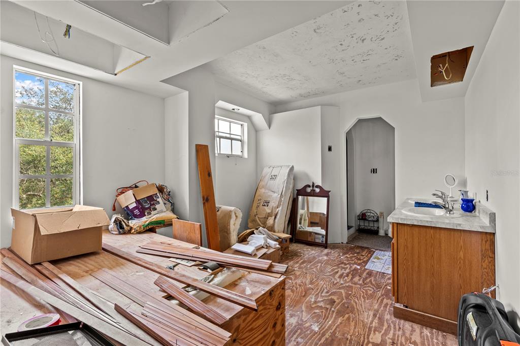 11419 Raschke Run Weeki Wachee, FL 34614 - Photo 10 of 19 a living room with furniture and a window