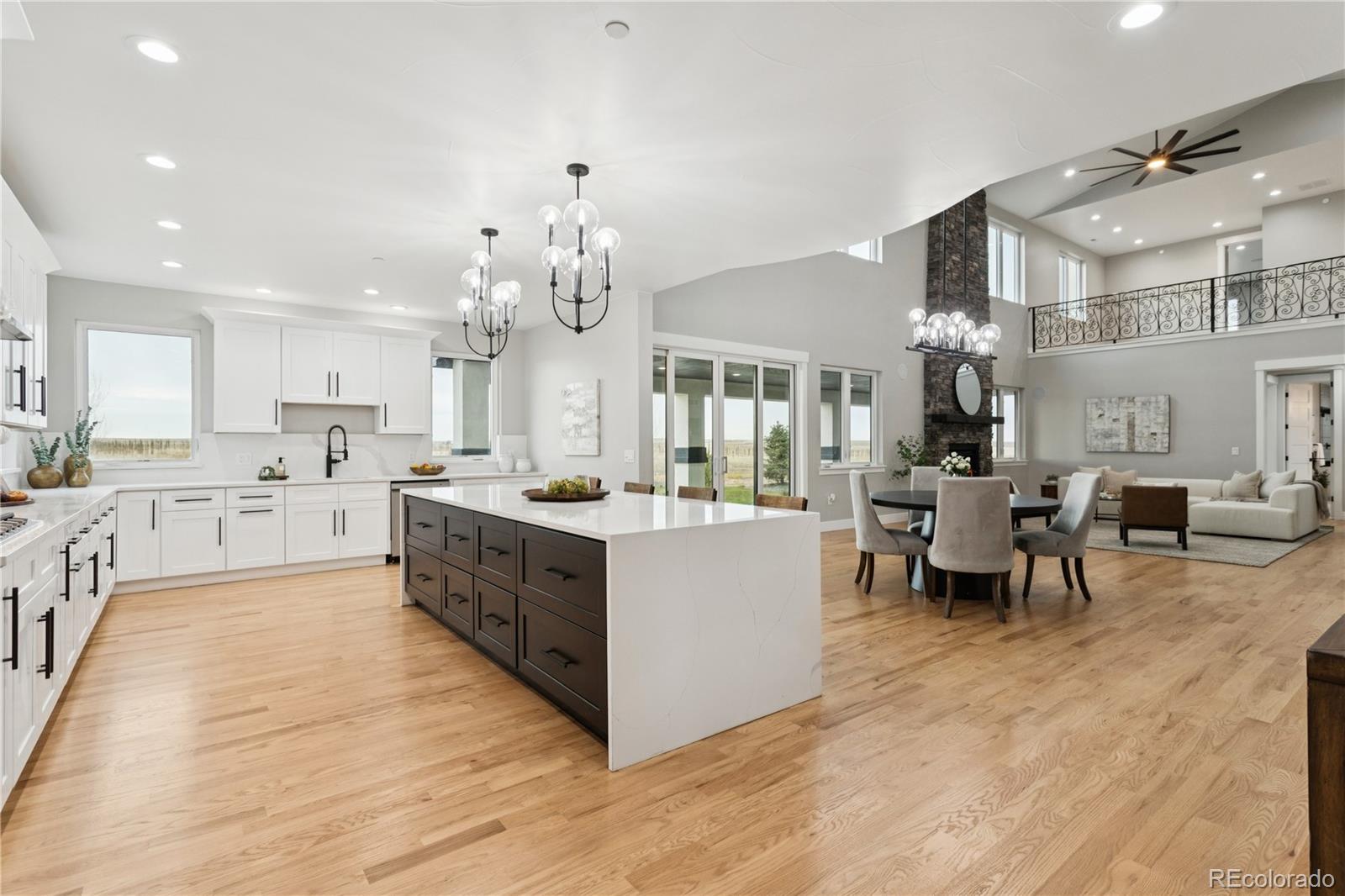 12550 Imboden Road Hudson, CO 80642 - Photo 15 of 50 a large kitchen with stainless steel appliances lots of counter top space