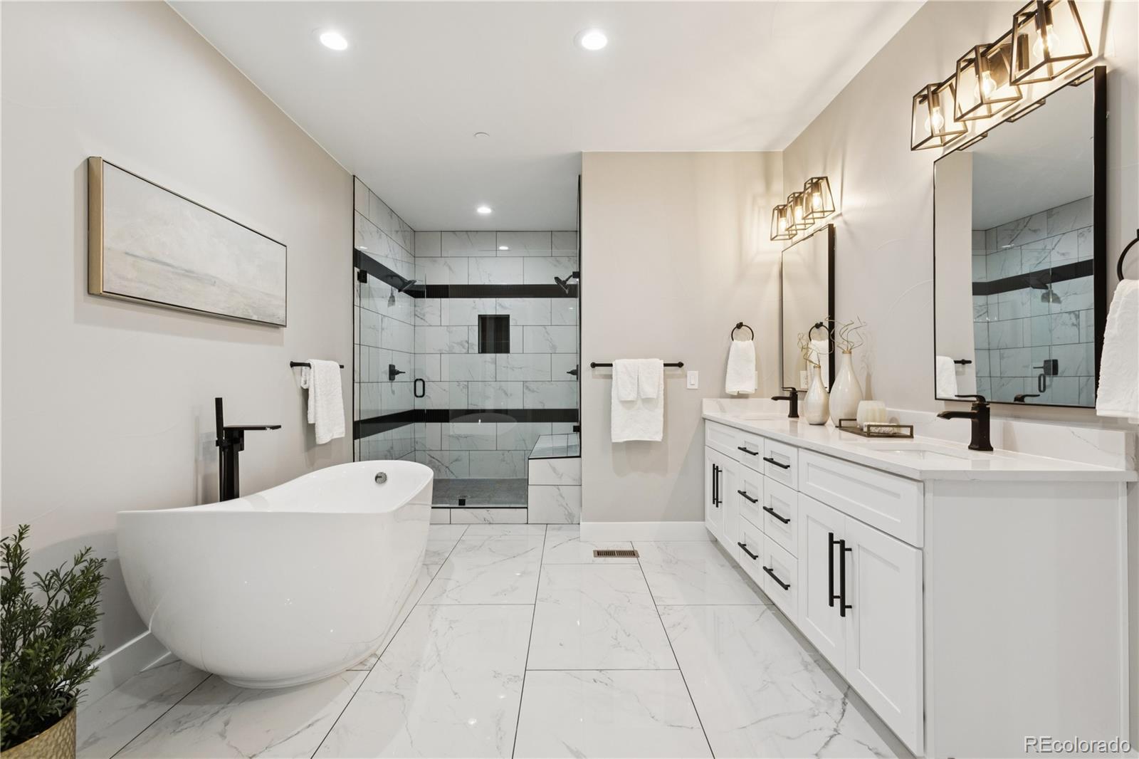 12550 Imboden Road Hudson, CO 80642 - Photo 24 of 50 a spacious bathroom with a bathtub and a sink