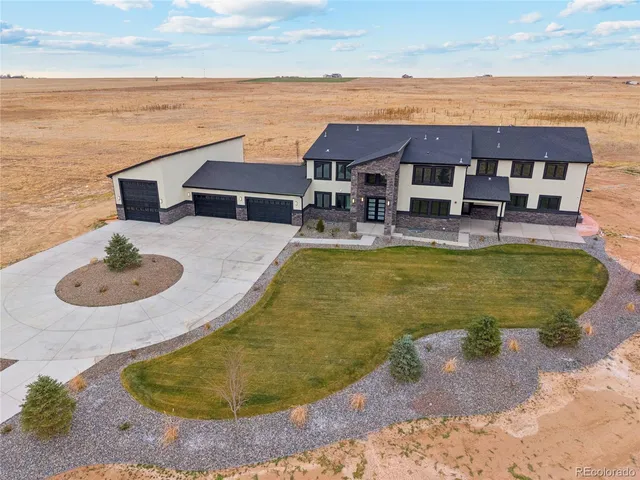 a view of a swimming pool with lounge chair