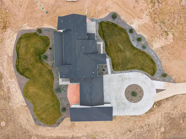 an aerial view of a swimming pool