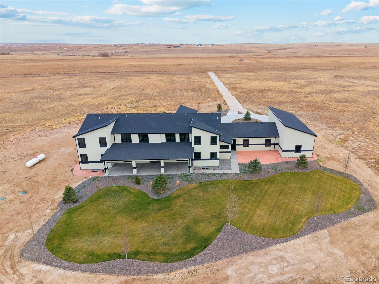 12550 Imboden Road Hudson, CO 80642 - Photo 45 of 50 a view of a house with pool and ocean view