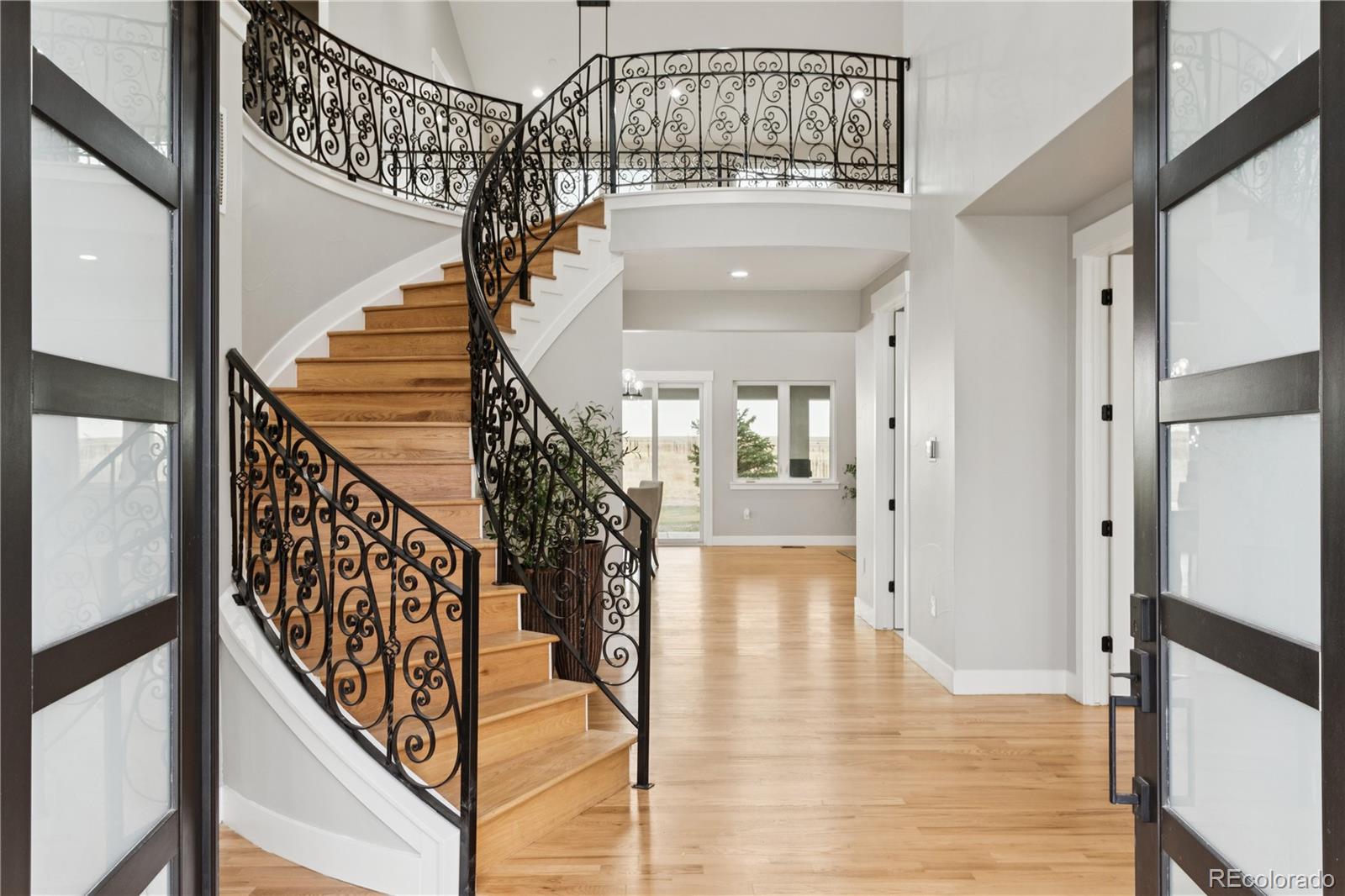 12550 Imboden Road Hudson, CO 80642 - Photo 5 of 50 a view of entryway and hall with wooden floor