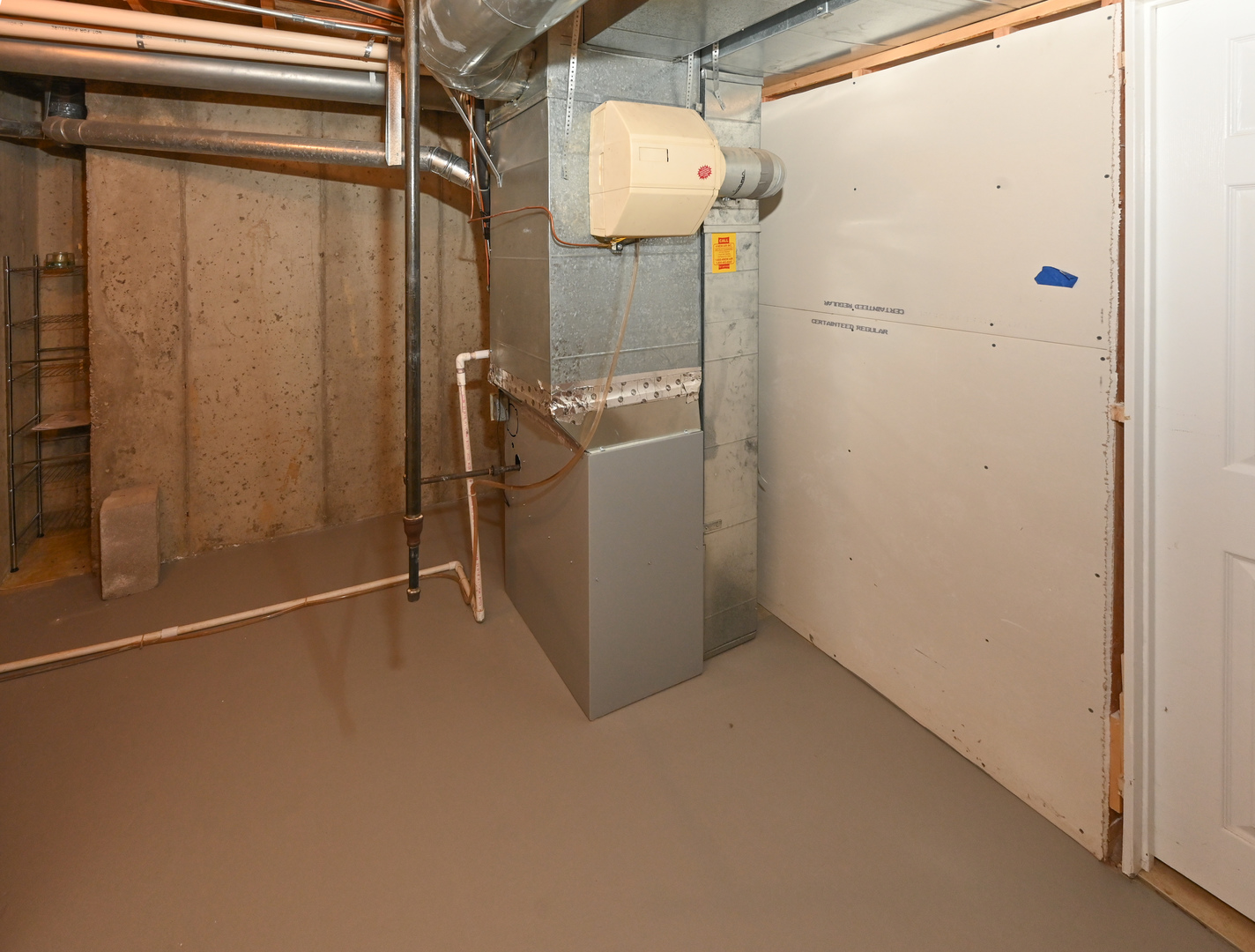 500 Greenview Lane Wheeling, IL 60090 - Photo 31 of 51 a view of a room with racks on the wall