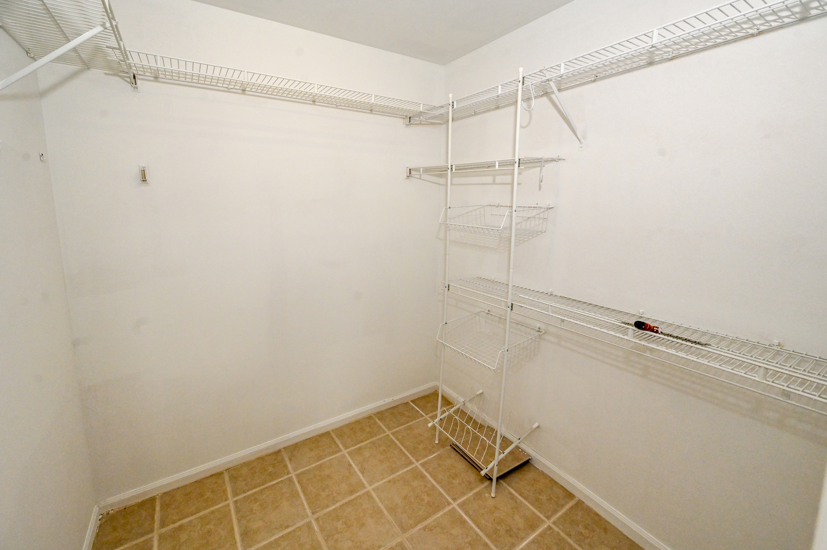 500 Greenview Lane Wheeling, IL 60090 - Photo 44 of 51 a view of a room with racks on the wall