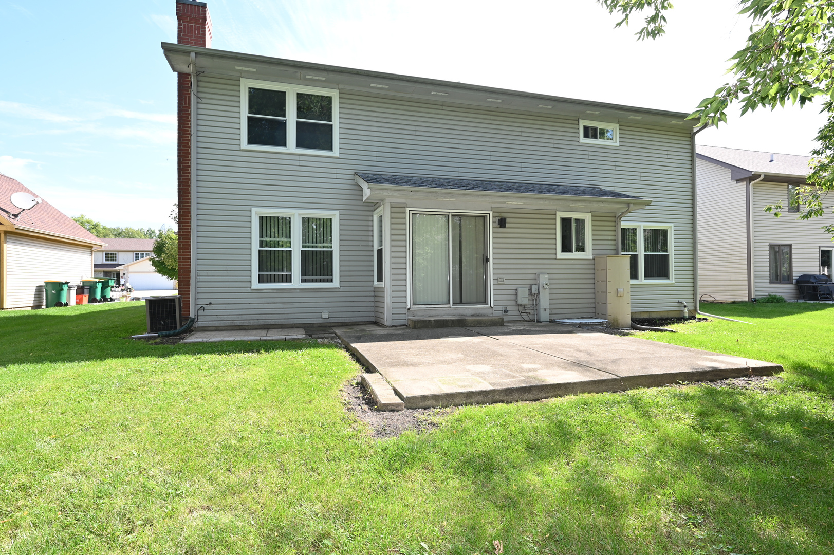 500 Greenview Lane Wheeling, IL 60090 - Photo 48 of 51 a house that has a big yard in front of it