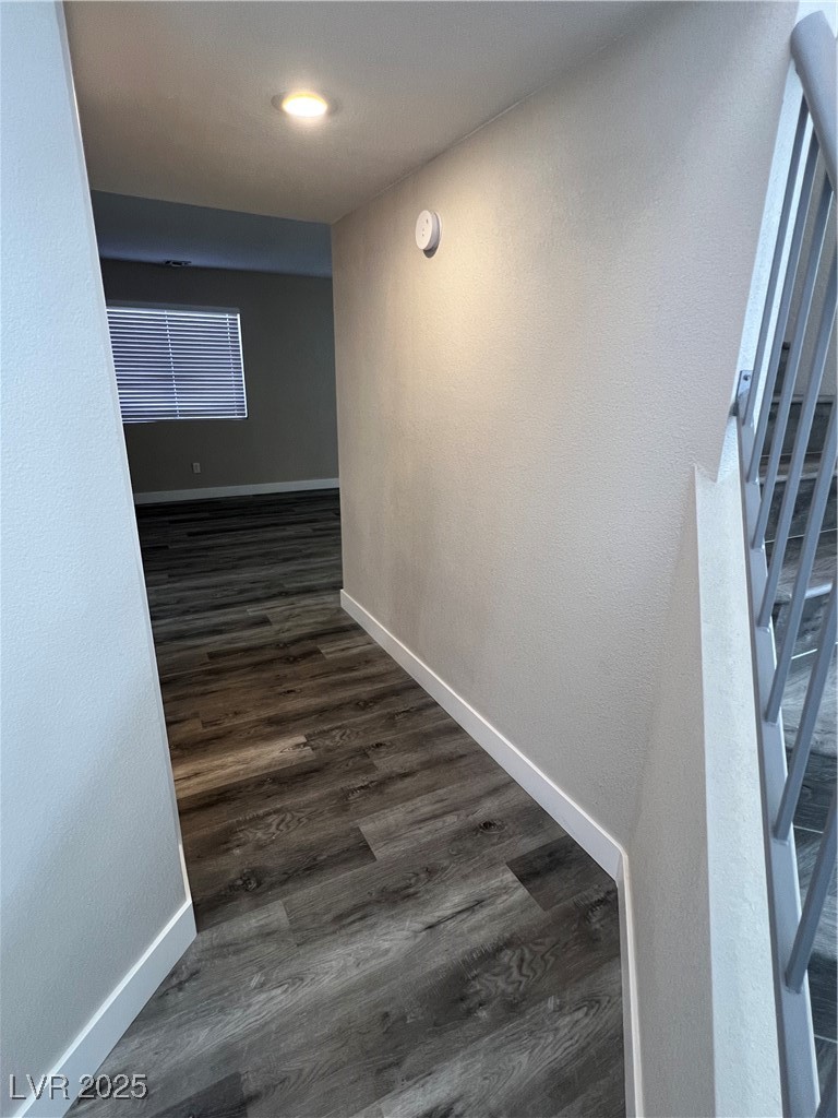 3238 Canyon Terrace Drive Laughlin, NV 89029 - Photo 7 of 41 Hall featuring dark wood-type flooring and a textured wall