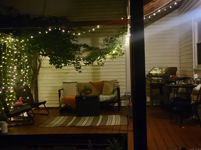 a view of a balcony with chairs