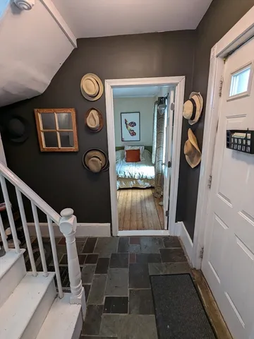 a view of entryway with a rug and a window