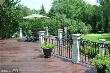 1841 Beulah Road Vienna, VA 22182 - Photo 7 of 30 IPE Wood Deck with Custom Iron Railing