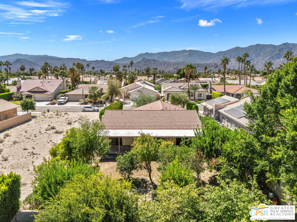 68600 Risueno Road Cathedral City, CA 92234 - Photo 2 of 30 a view of a city with mountains in the background