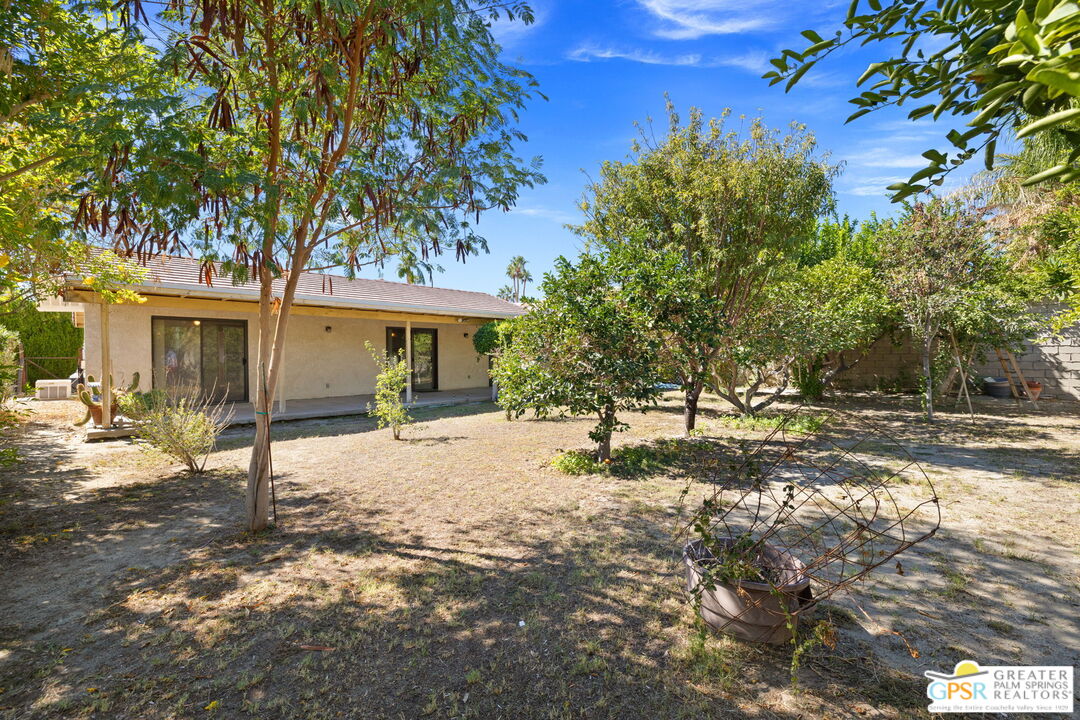 68600 Risueno Road Cathedral City, CA 92234 - Photo 3 of 30 a view of a house with a tree