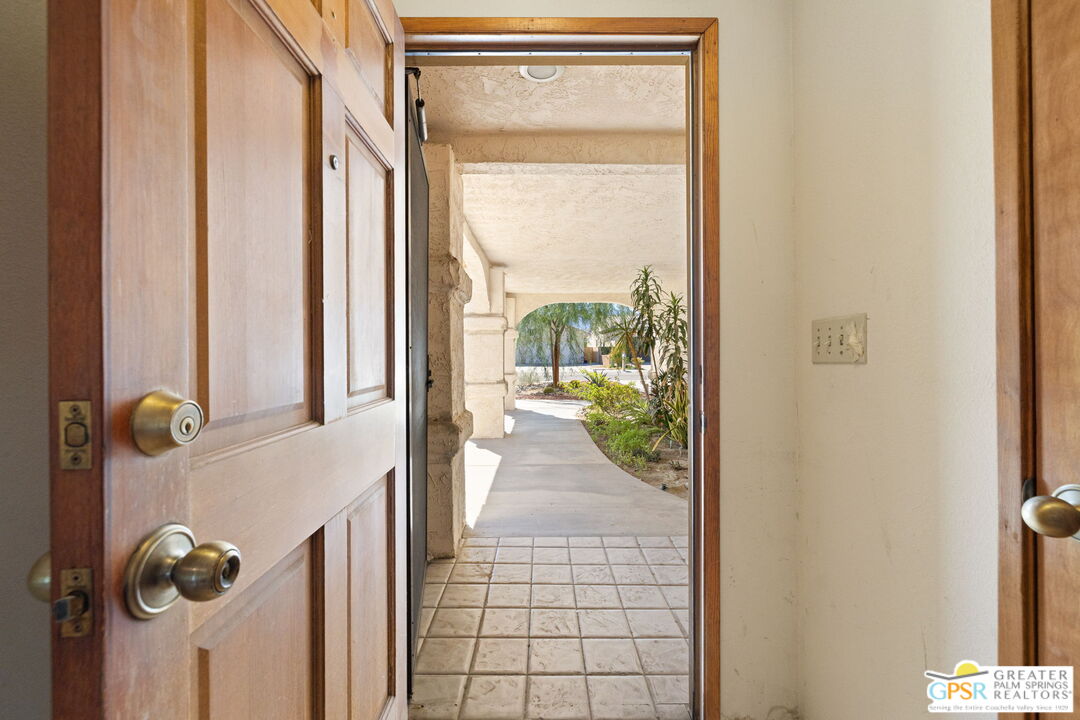 68600 Risueno Road Cathedral City, CA 92234 - Photo 9 of 30 a view of a door and a window