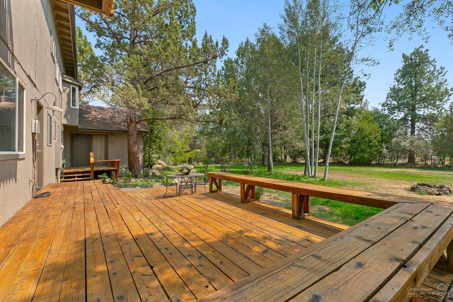 19005 Couch Market Road Bend, OR 97703 - Photo 7 of 22 a view of a swimming pool with a patio