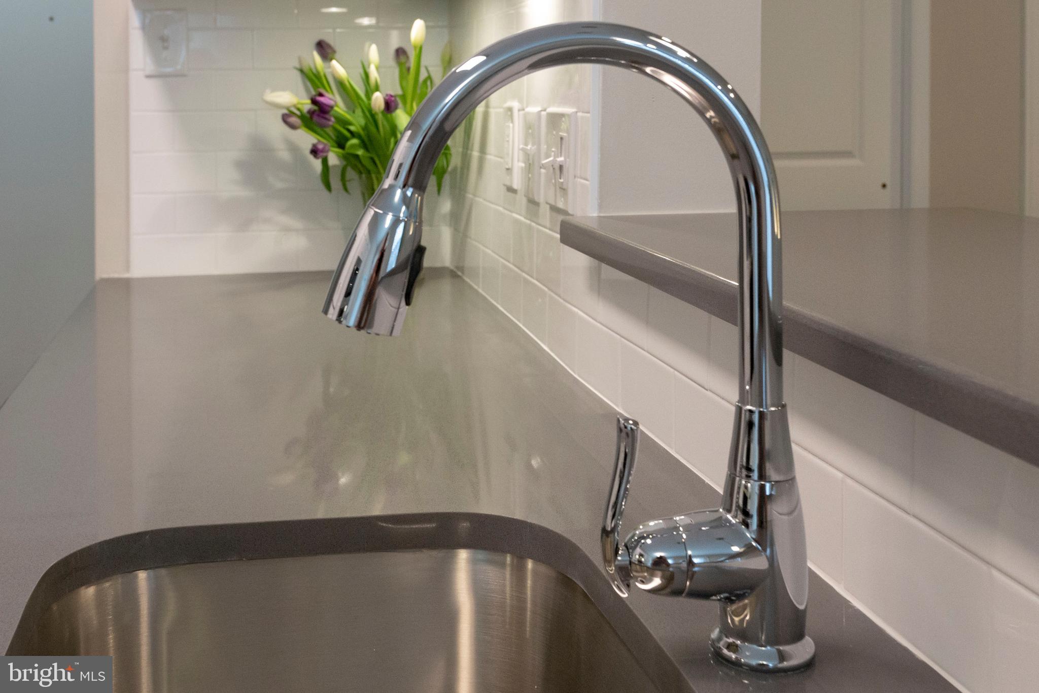 313 Creek Drive, Unit 53 Wayne, PA 19087 - Photo 6 of 17 Sleek chrome fixtures and under mount sink