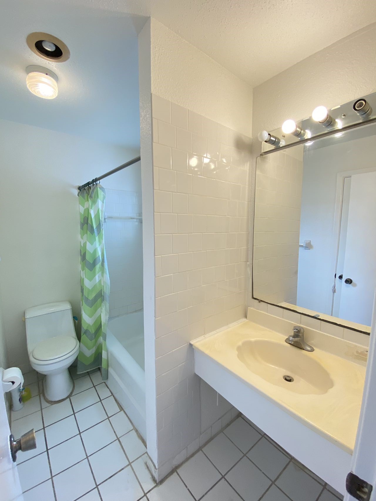 6201 Ranchester Drive, Unit 19 Houston, TX 77036 - Photo 13 of 26 a bathroom with a sink a toilet and shower