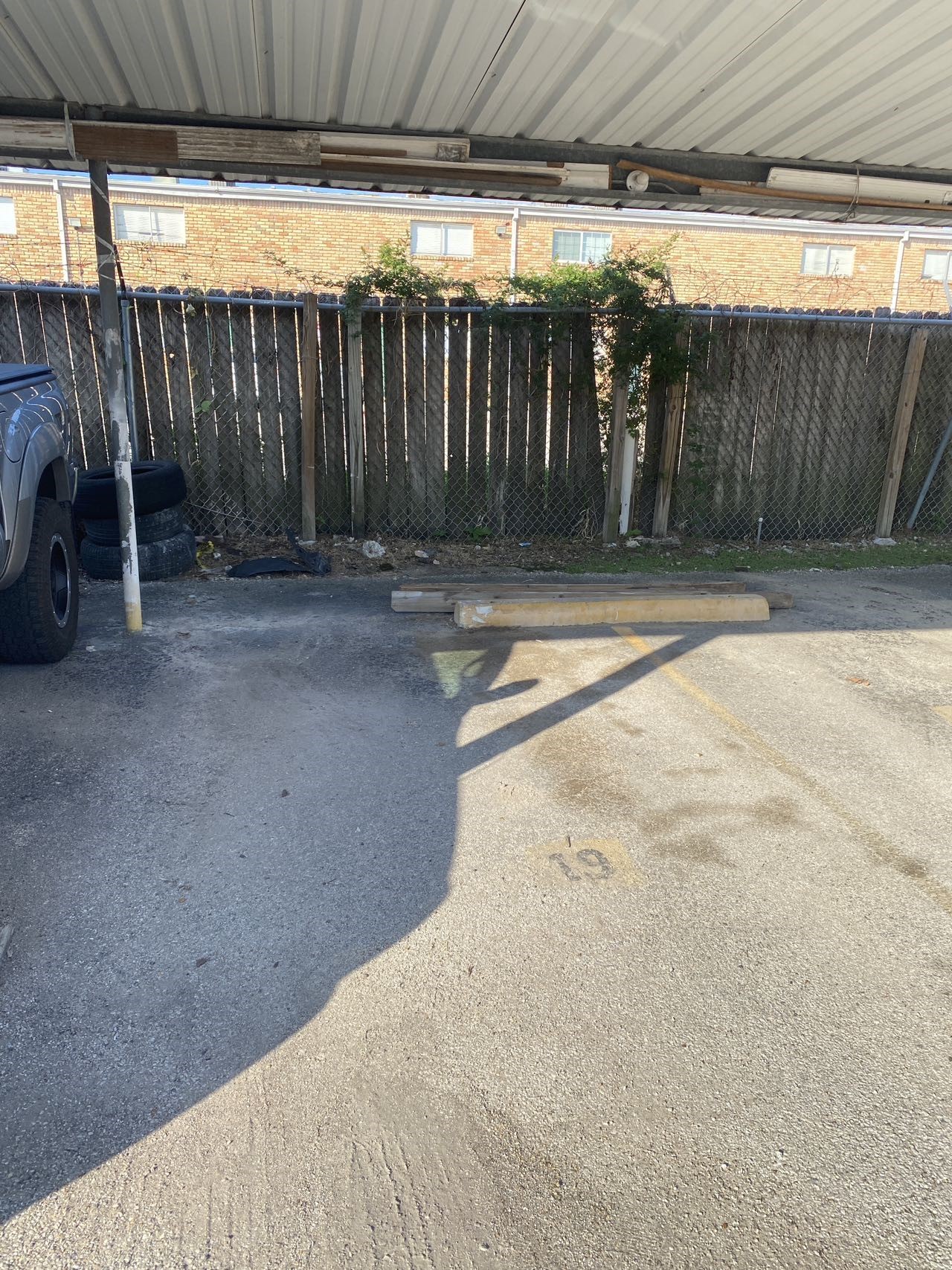 6201 Ranchester Drive, Unit 19 Houston, TX 77036 - Photo 20 of 26 a view of a backyard with a small cabin