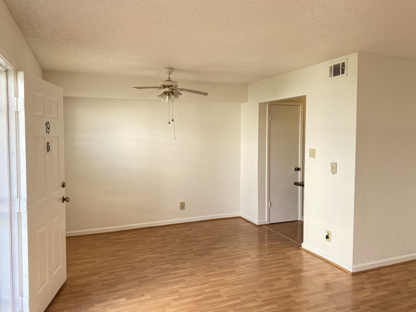 6201 Ranchester Drive, Unit 19 Houston, TX 77036 - Photo 8 of 26 wooden floor in an empty room