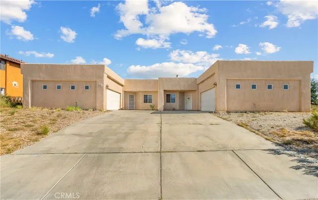 a view of a house with a snow