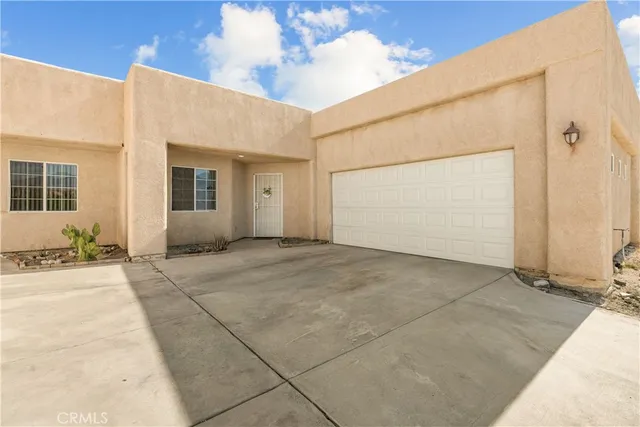 a view of a house with a outdoor space