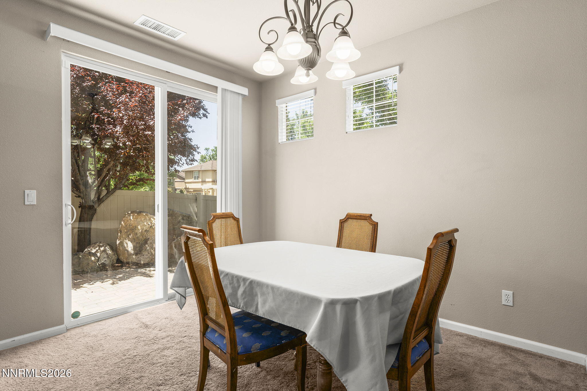 11041 Colton Drive Reno, NV 89521 - Photo 7 of 28 a view of a dining room with furniture window and wooden floor