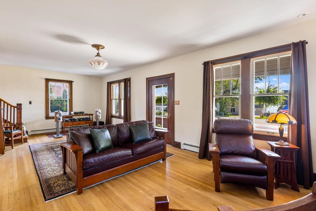 1059 North Riverside Avenue St. Clair, MI 48079 - Photo 8 of 27 The home faces east with view of the river from the large windows. The room floods with light in the morning.