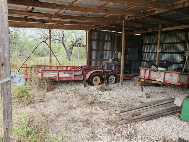 a blue and white bench sitting in front of a building