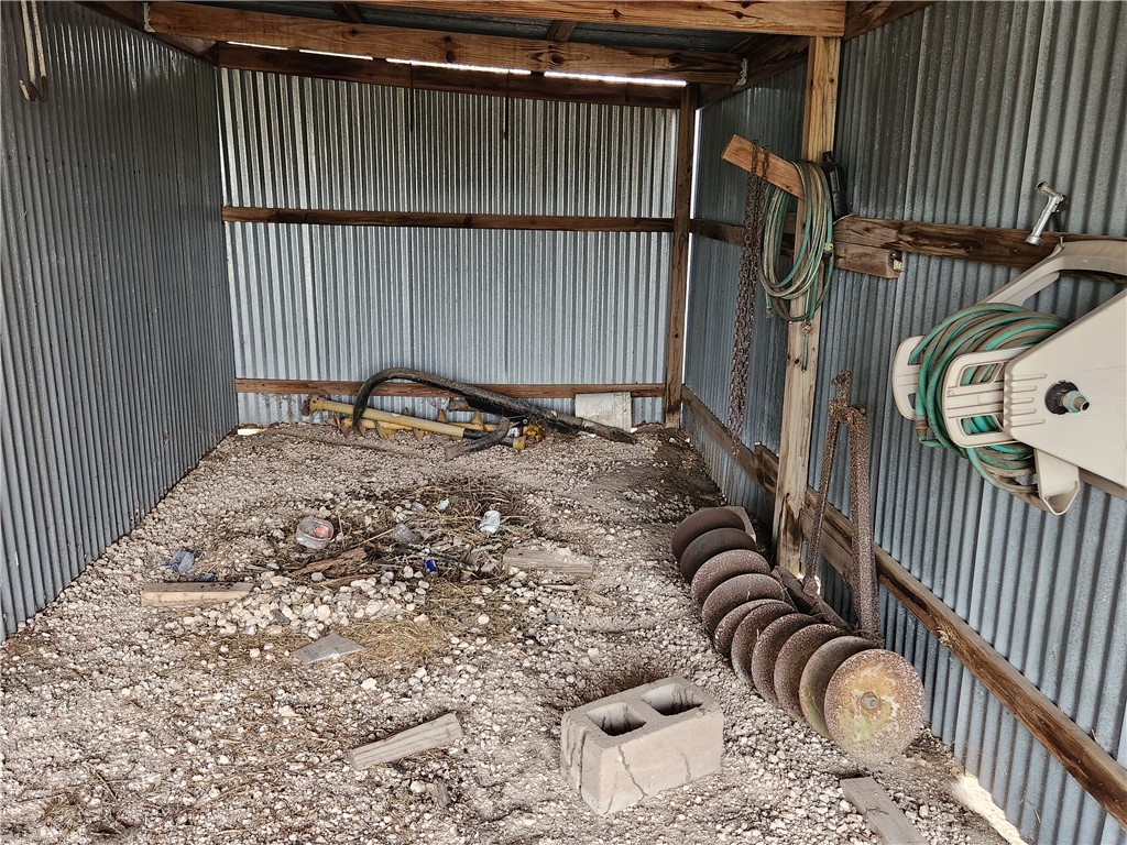1888 County Road 440 Alice, TX 78332 - Photo 18 of 32 a view of a backyard with wooden fence