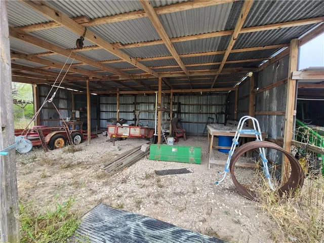 a view of a balcony with furniture