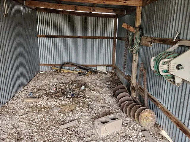 a view of house with backyard space and balcony